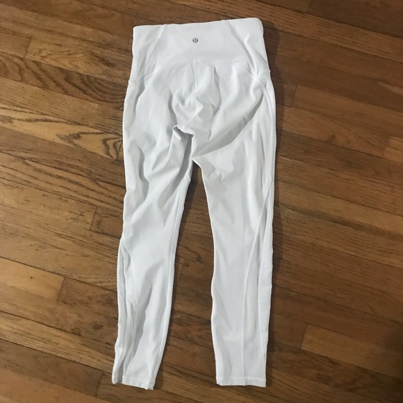 Lululemon white leggings with see through detail on lower legs. - Picture 2 of 8